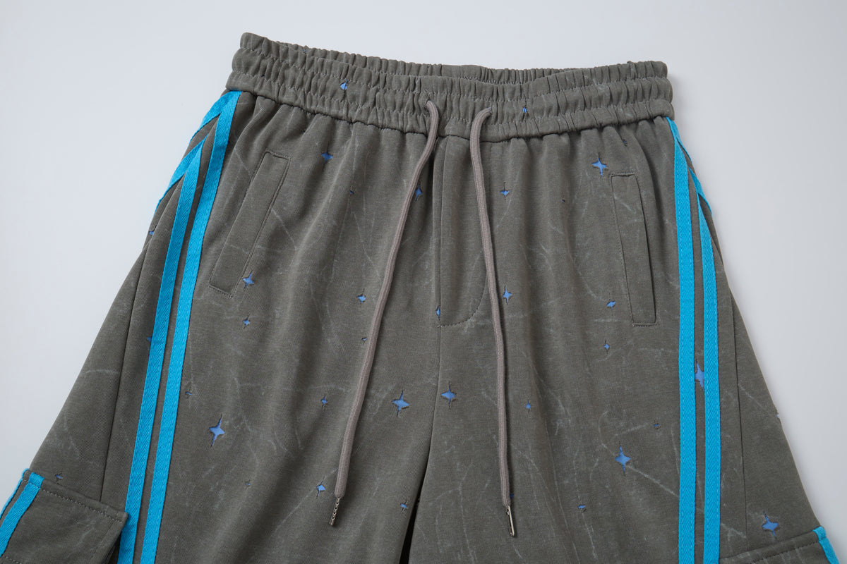 Women’s Cosmic Drift Star-Print Cargo Pants – Washed Gray Baggy Barrel Pants with Blue Racing Stripes