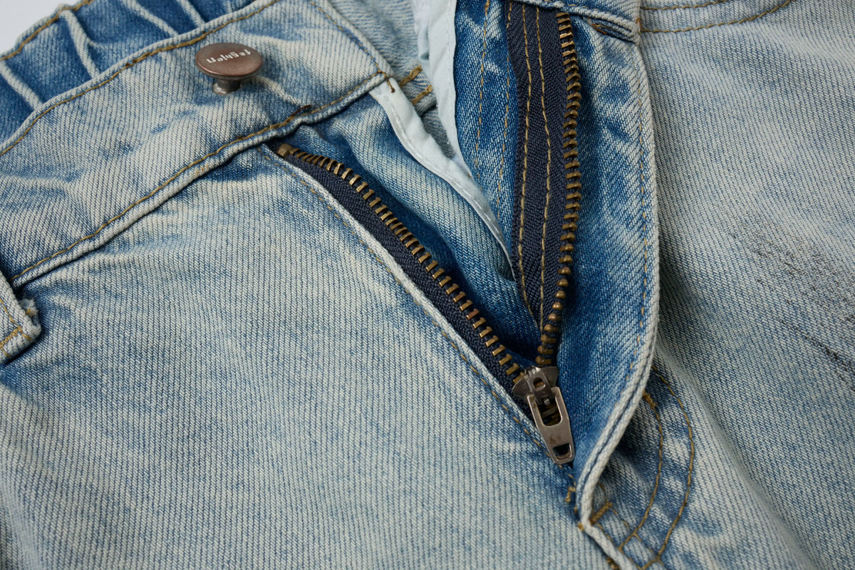 Vintage Washed Distressed Jeans – Light Blue Wide-Leg Denim
