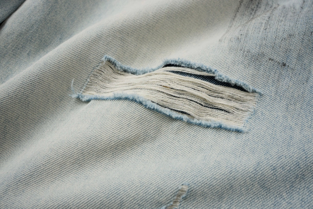 Vintage Washed Distressed Jeans – Light Blue Wide-Leg Denim