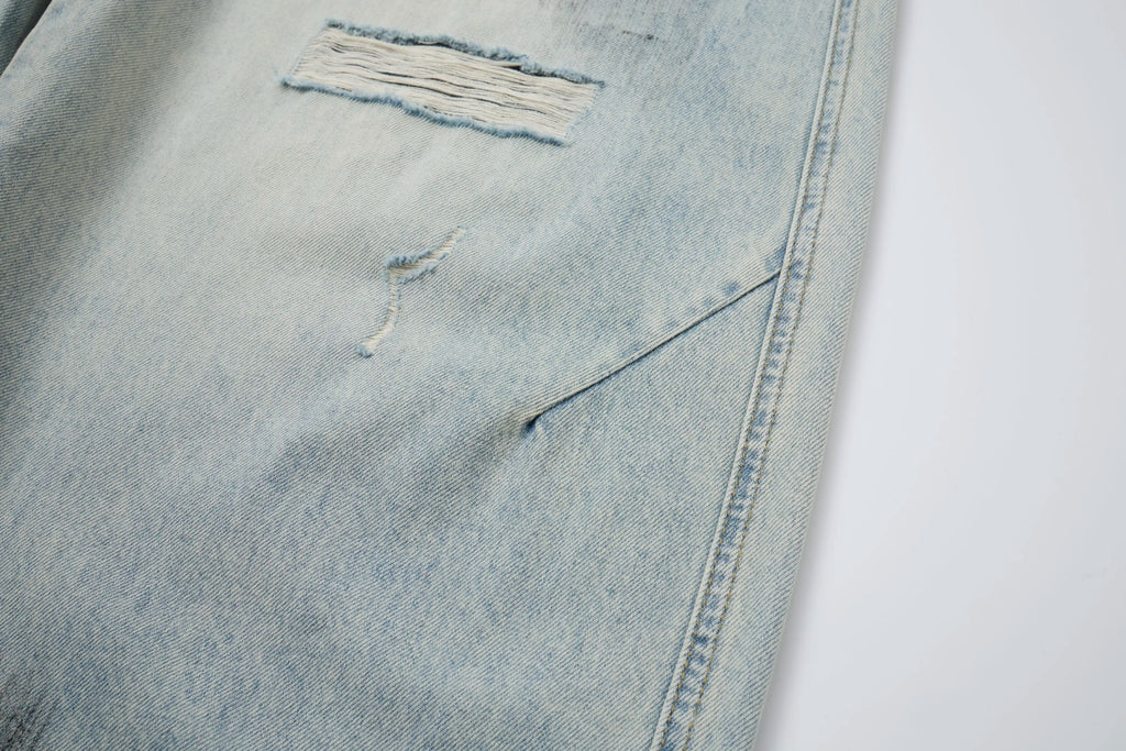Vintage Washed Distressed Jeans – Light Blue Wide-Leg Denim