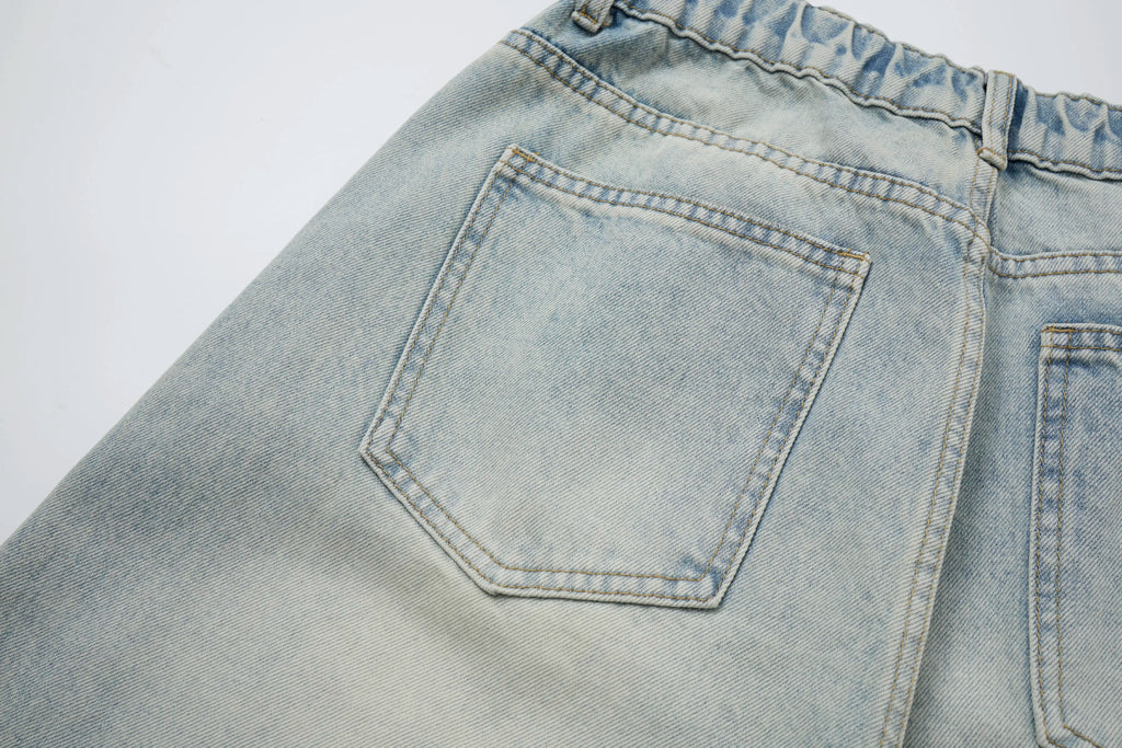 Vintage Washed Distressed Jeans – Light Blue Wide-Leg Denim