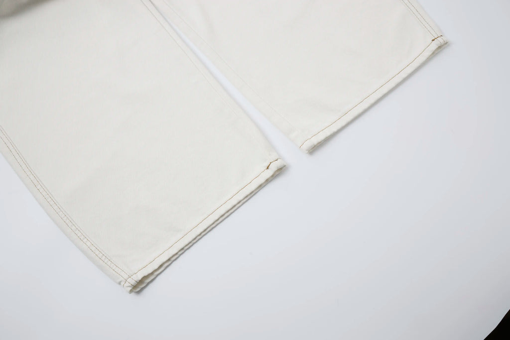 Washed Ivory Distressed Jeans – Wide-Leg Street Denim