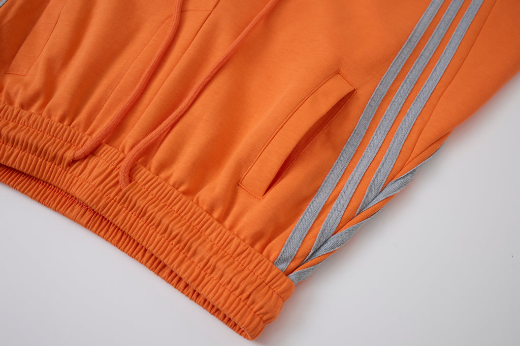 Women’s Retro Orange Striped Wide-Leg Track Pants with Adjustable Cinch Hems
