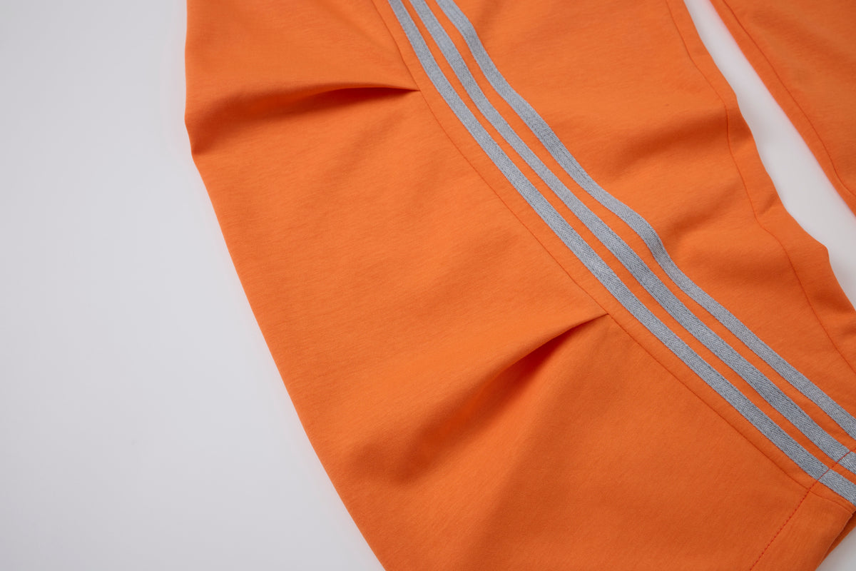 Women’s Retro Orange Striped Wide-Leg Track Pants with Adjustable Cinch Hems