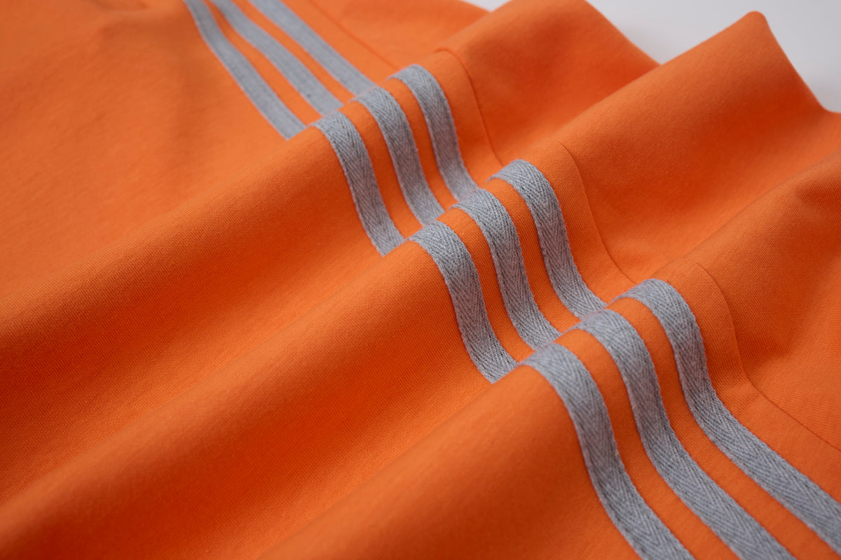 Women’s Retro Orange Striped Wide-Leg Track Pants with Adjustable Cinch Hems