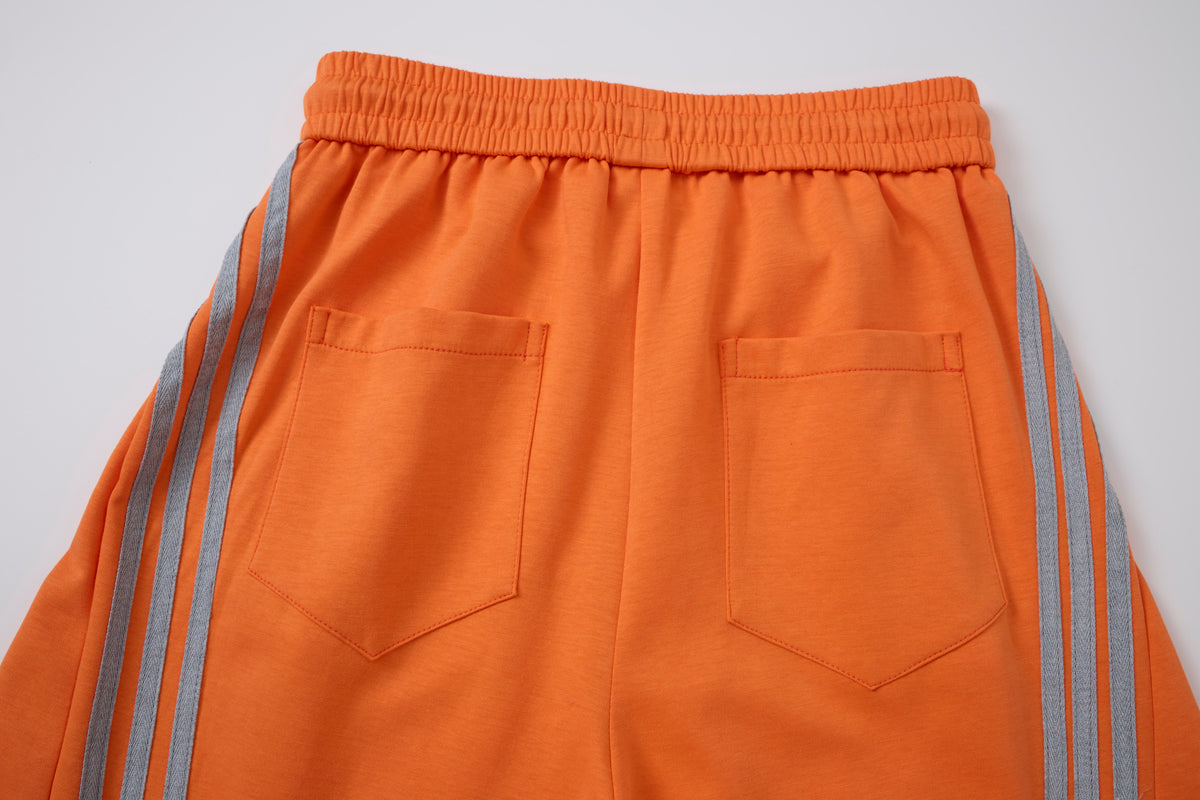 Women’s Retro Orange Striped Wide-Leg Track Pants with Adjustable Cinch Hems