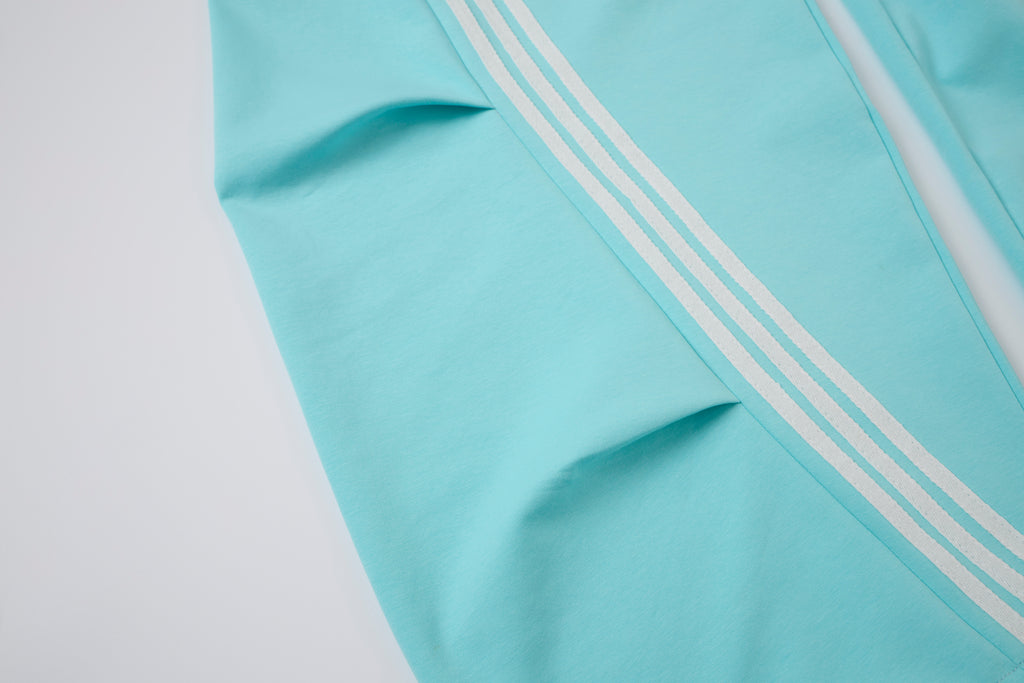 Women’s Light Blue Triple-Stripe Baggy Wide-Leg Track Pants with Drawstring Waist and Pockets